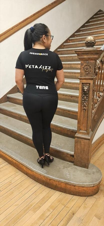 The back of the T-shirt with her name, TERE